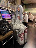 Distressed Reversible Slogan Sweatpants