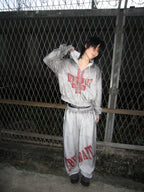 Distressed Reversible Slogan Sweatpants