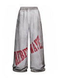Distressed Reversible Slogan Sweatpants