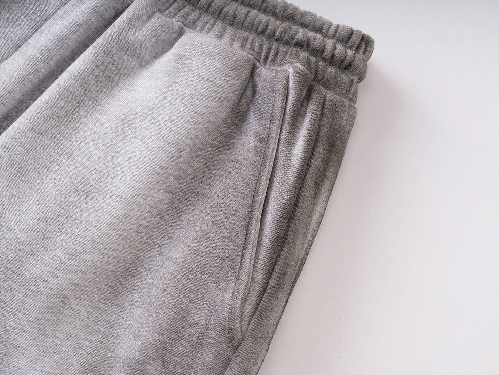 Distressed Reversible Slogan Sweatpants