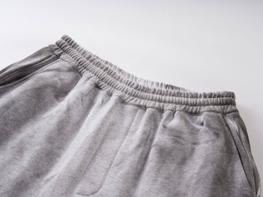Distressed Reversible Slogan Sweatpants