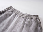 Distressed Reversible Slogan Sweatpants