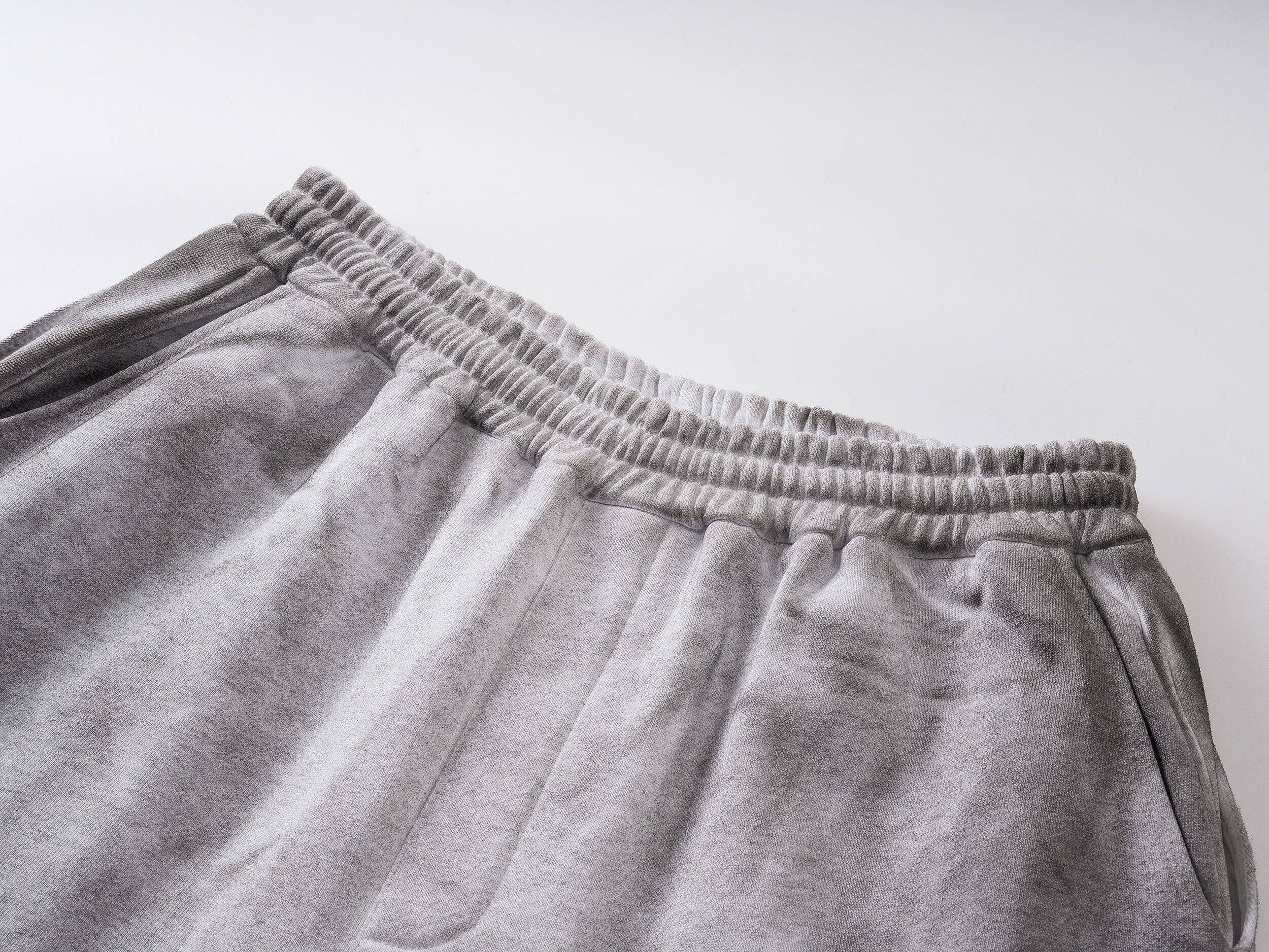 Distressed Reversible Slogan Sweatpants