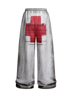 Distressed Reversible Slogan Sweatpants